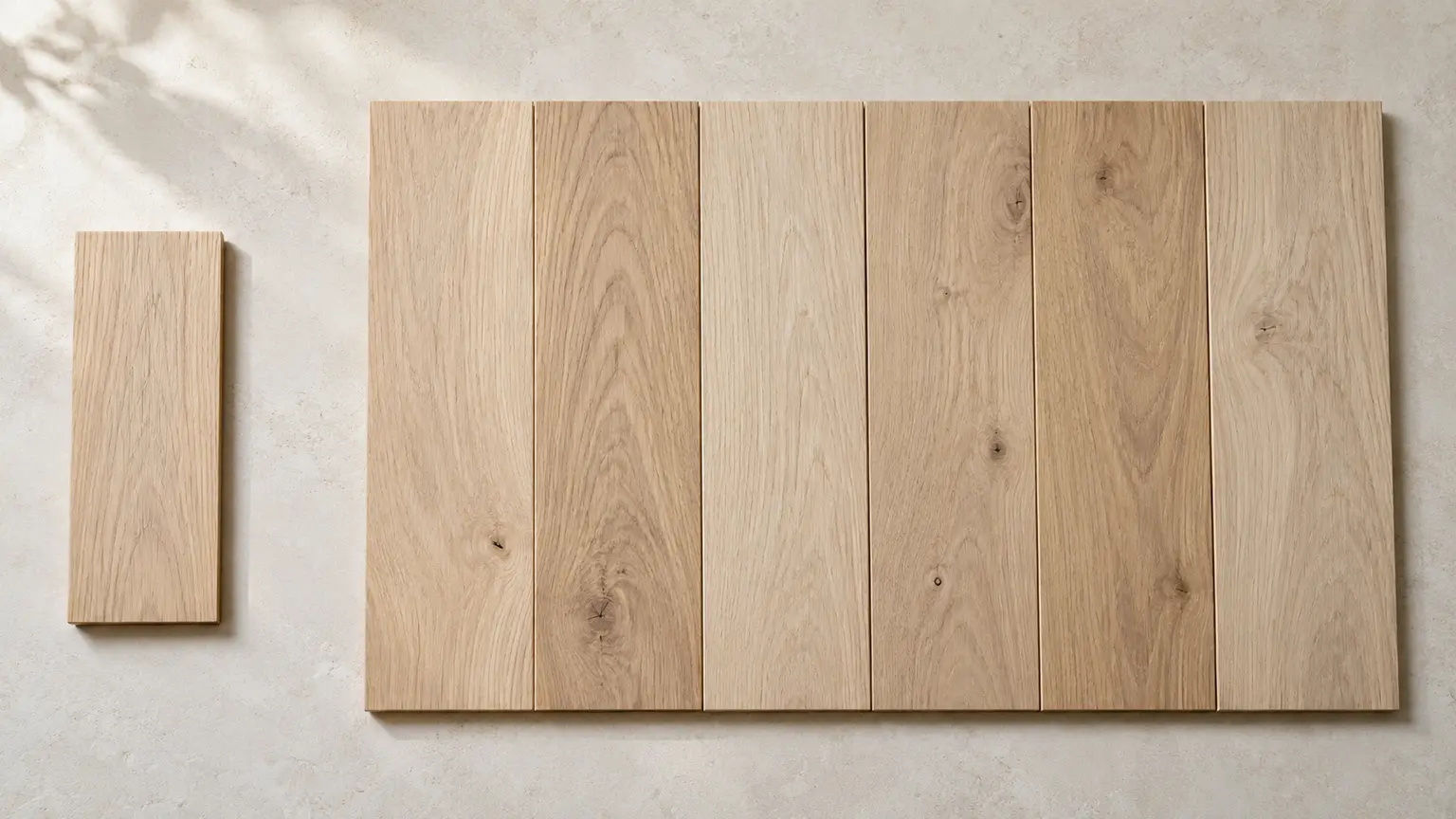 Wood boards laid together with different grain patterns and darker areas